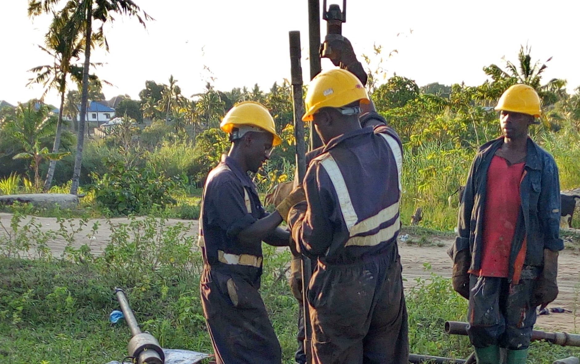 African geotechnical engineers carrying out soil investigation